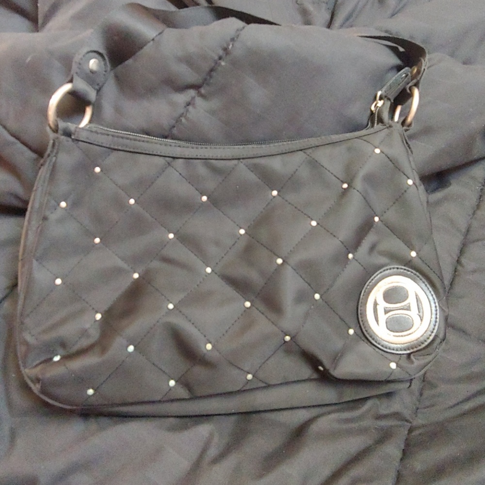 Black and gold Bebe purse